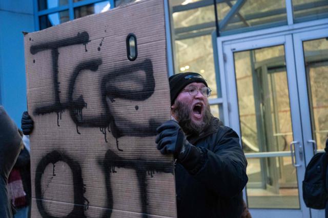 A man shouts slogans against the US Immigration and Customs Enforcement (ICE) while protesting outside the state office of US Senator Amy Klobuchar, Democrat of Minnesota, following last week fatal shooting of 37-year-old ICU nurse Alex Pretti by federal immigration agents, in Minneapolis, Minnesota, on January 26, 2026. On January 24, federal agents shot and killed Alex Pretti, a 37-year-old ICU nurse, while scuffling with him on an icy roadway in Minneapolis, less than three weeks after an immigration officer fired on Renee Good, also 37, killing her in her car. US President Donald Trump blamed their deaths on Democratic "chaos," as his administration faced intensifying pressure over its mass immigration crackdown in Minneapolis. (Photo by ROBERTO SCHMIDT / AFP)