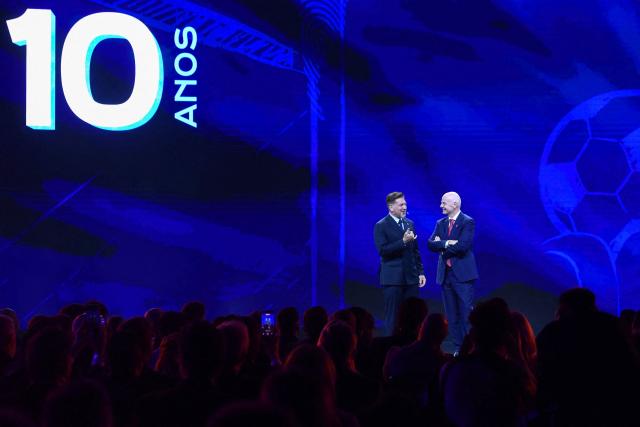 FIFA President Gianni Infantino (R) and CONMEBOL President Alejandro Dominguez (L) speak during a commemorative event marking the 10th anniversary of Dominguez's work as the head of the South American Football Confederation in Luque, Paraguay on January 26, 2026. (Photo by Daniel DUARTE / AFP)