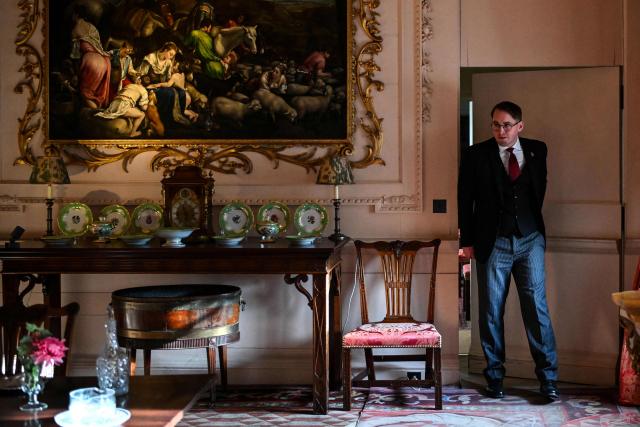 This photo taken on January 16, 2026 shows head butler Stuart Banks working at Dumfries House, headquarters of the King's Foundation near Cumnock, south of Glasgow, Scotland. The 2,000-acre estate is the headquarters of the King's Foundation and at the heart of a new Amazon Prime documentary "Finding Harmony: A King's Vision" which is set to premiere on January 28. (Photo by Andy BUCHANAN / AFP) / TO GO WITH Britain-royals-environment-climate-charity-education, REPORTAGE by Akshata KAPOOR