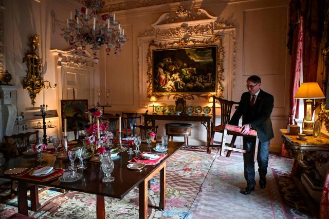 This photo taken on January 16, 2026 shows head butler Stuart Banks working at Dumfries House, headquarters of the King's Foundation near Cumnock, south of Glasgow, Scotland. The 2,000-acre estate is the headquarters of the King's Foundation and at the heart of a new Amazon Prime documentary "Finding Harmony: A King's Vision" which is set to premiere on January 28. (Photo by Andy BUCHANAN / AFP) / TO GO WITH Britain-royals-environment-climate-charity-education, REPORTAGE by Akshata KAPOOR