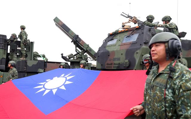 Taiwan military personnel take part in a spring military exercise in Taichung on January 27, 2026. (Photo by I-Hwa Cheng / AFP)