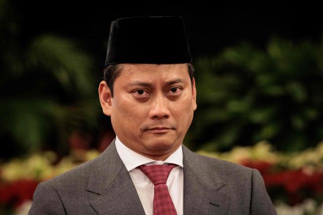 (FILES) Newly appointed Deputy Finance Minister Thomas Djiwandono, nephew of Indonesia's Defence Minister and President-elect Prabowo Subianto, speaks to the media after his inauguration at the Presidential Palace in Jakarta on July 18, 2024. Indonesia's parliament confirmed the appointment of President Prabowo Subianto's nephew Djiwandono to the central bank board on January 27, 2026, shrugging off concerns about the financial institution's independence. (Photo by Yasuyoshi CHIBA / AFP)