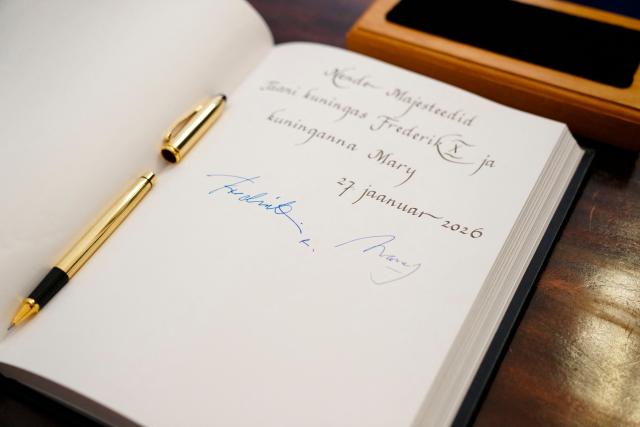 The signatures of King Frederik X of Denmark and Queen Mary of Denmark are seen in the Estonian President's guest book during their visit in Tallinn, Estonia, on January 27, 2026. The royal couple is on a state visit to Estonia from January 27-28, 2026. The visit particularly focuses on digital resilience and cybersecurity. (Photo by Ida Marie Odgaard / Ritzau Scanpix / AFP) / Denmark OUT