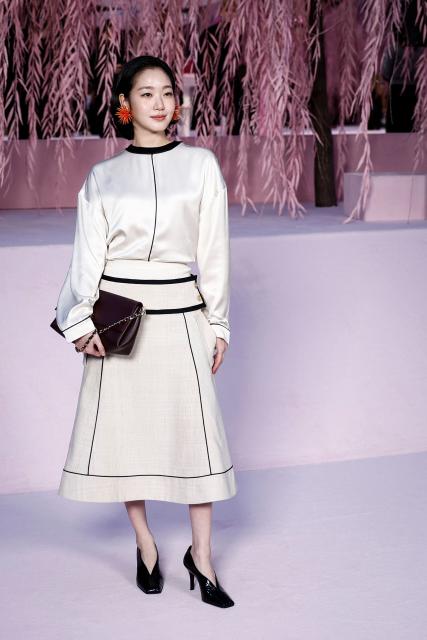 South-Korean actress Kim Go-eun poses upon arrival for the Chanel Women's Haute Couture Spring/Summer 2026 collection fashion show as part of the Paris Haute Couture Fashion Week, in Paris, on January 27, 2026. (Photo by Sebastien DUPUY / AFP)