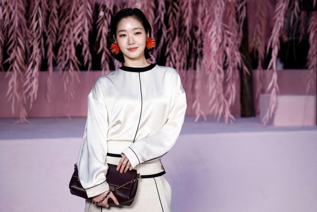 South-Korean actress Kim Go-eun poses upon arrival for the Chanel Women's Haute Couture Spring/Summer 2026 collection fashion show as part of the Paris Haute Couture Fashion Week, in Paris, on January 27, 2026. (Photo by Sebastien DUPUY / AFP)