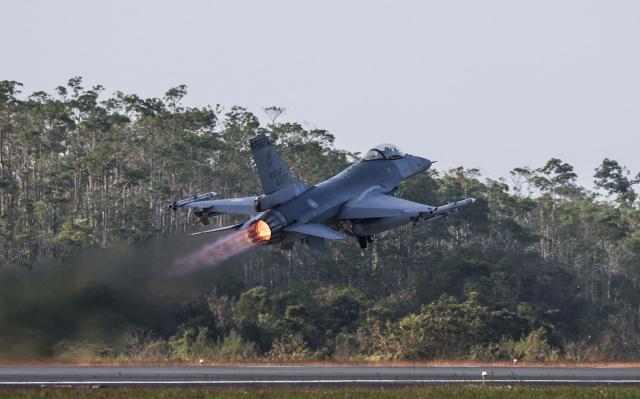 A Taiwanese air force F-16V fighter aircraft takes off during a military exercise at Chiayi Air Base in Chiayi on January 27, 2026. (Photo by I-Hwa Cheng / AFP)