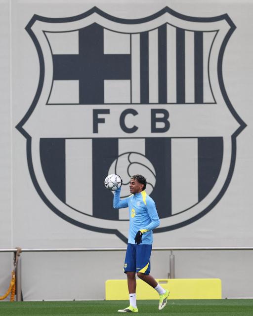 Barcelona's Spanish forward #10 Lamine Yamal attends a training session on the eve of the UEFA Champions League, League phase matchday 8 match between FC Barcelona and FC Copenhagen at the Joan Gamper training ground in Sant Joan Despi, near Barcelona, on January 27, 2026. (Photo by Josep LAGO / AFP)