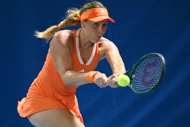 France's Leolia Jeanjean hits a return against Germany's Tatjana Maria during their women's singles match at the Philippine Women's Open tennis tournament in Manila on January 27, 2026. (Photo by Ted ALJIBE / AFP)