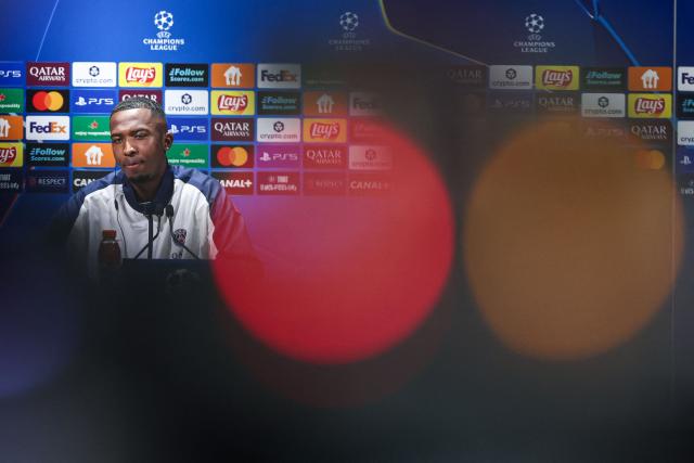Paris Saint-Germain's Ecuadoran defender #51 Willian Pacho speaks during a press conference at the Campus Paris Saint-Germain in Poissy, in the western outskirts of Paris on January 27, 2026, on the eve of the UEFA Champions League first round day 8 football match between Paris Saint-Germain and Newcastle. (Photo by FRANCK FIFE / AFP)