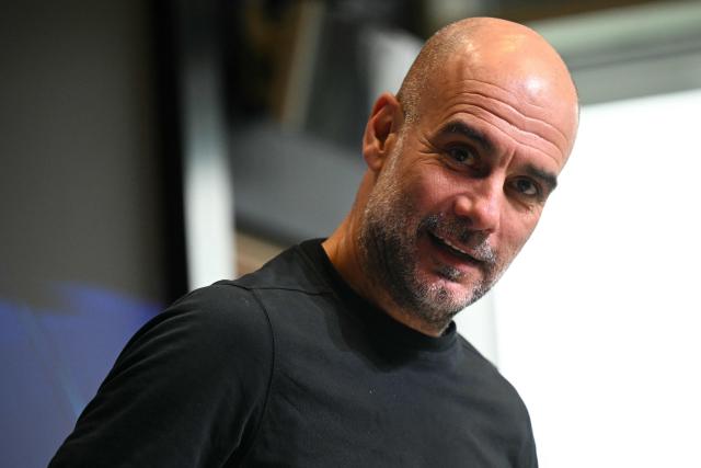 Manchester City's Spanish manager Pep Guardiola arrives to attend a press conference at the Etihad Campus training ground in Manchester, north-west England, on January 27, 2026, on the eve of their UEFA Champions League, league stage football match against Galatasaray. (Photo by Oli SCARFF / AFP)
