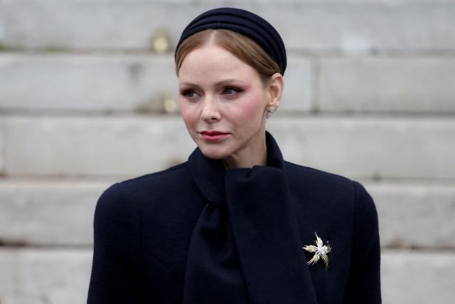 Princess Charlene of Monaco leaves the cathedral after taking part in the traditional festivities of Sainte Devote in the Principalty of Monaco on January 27, 2026. (Photo by Valery HACHE / AFP) / NO TABLOIDS WEB & PRINT, NO DAILY MAIL, NO DAILY MAIL GROUP, NO VOICI, NO CLOSER