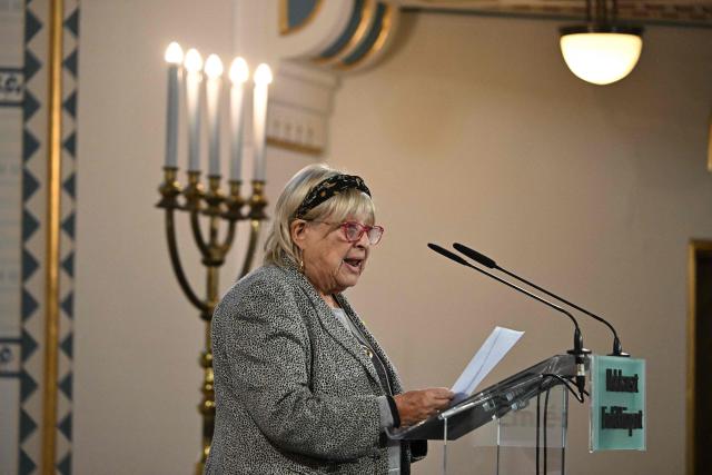 Holocaust survivor Katalin Sommer delivers a speech during a commemoration of the International Holocaust Remembrance Day at the synagogye of the Holocaust Memorial Center in Budapest, Hungary, on January 27, 2026. The choice of January 27 for the annual commemoration aligns with the liberation of the Auschwitz concentration camp by the Red Army in 1945. (Photo by Attila KISBENEDEK / AFP)