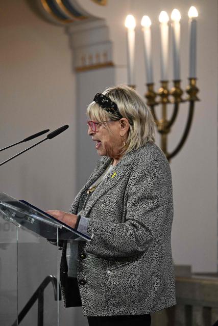 Holocaust survivor Katalin Sommer delivers a speech during a commemoration of the International Holocaust Remembrance Day at the synagogye of the Holocaust Memorial Center in Budapest, Hungary, on January 27, 2026. The choice of January 27 for the annual commemoration aligns with the liberation of the Auschwitz concentration camp by the Red Army in 1945. (Photo by Attila KISBENEDEK / AFP)