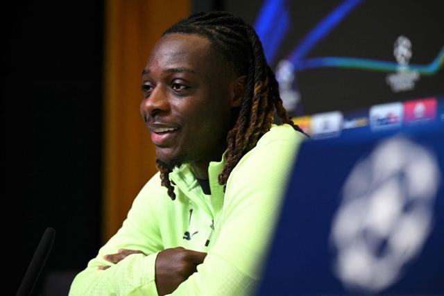 Manchester City's Belgian midfielder #11 Jeremy Doku speaks during a press conference at the Etihad Campus training ground in Manchester, north-west England, on January 27, 2026, on the eve of their UEFA Champions League, league stage football match against Galatasaray. (Photo by Oli SCARFF / AFP)