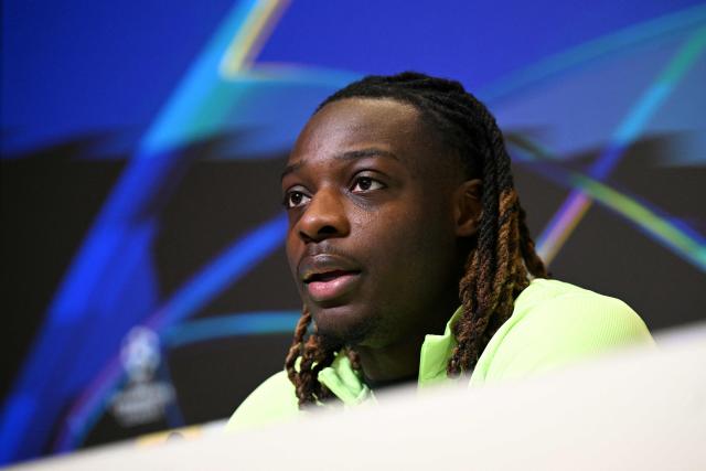 Manchester City's Belgian midfielder #11 Jeremy Doku speaks during a press conference at the Etihad Campus training ground in Manchester, north-west England, on January 27, 2026, on the eve of their UEFA Champions League, league stage football match against Galatasaray. (Photo by Oli SCARFF / AFP)