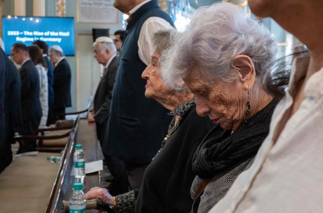 Delegates attend the commemoration of International Holocaust Remembrance Day at the Keneseth Eliyahoo Synagogue in Mumbai on January 27, 2026. (Photo by Punit PARANJPE / AFP)