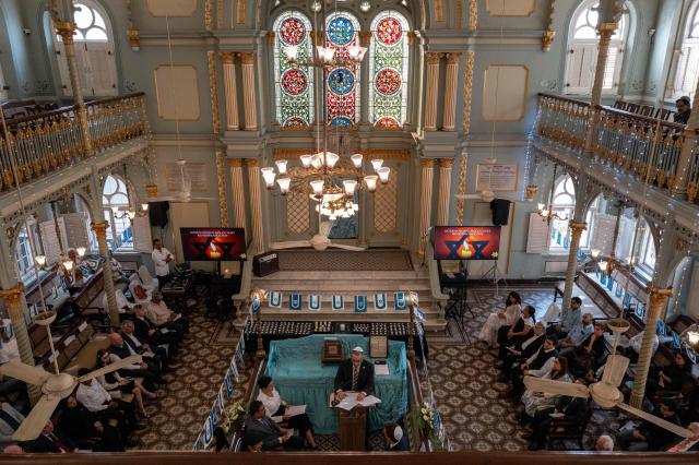 Delegates attend the commemoration of International Holocaust Remembrance Day at the Keneseth Eliyahoo Synagogue in Mumbai on January 27, 2026. (Photo by Punit PARANJPE / AFP)