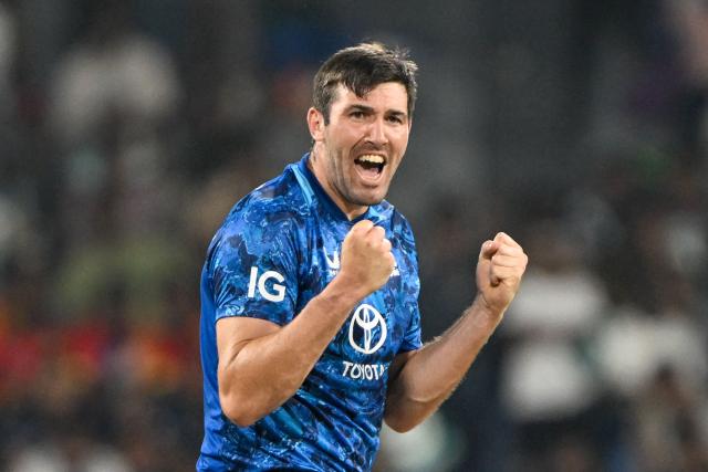 England's Jamie Overton celebrates after taking the wicket of Sri Lanka's Pathum Nissanka during the third one-day international (ODI) cricket match between Sri Lanka and England at the R. Premadasa International Cricket Stadium in Colombo on January 27, 2026. (Photo by Ishara S. KODIKARA / AFP)
