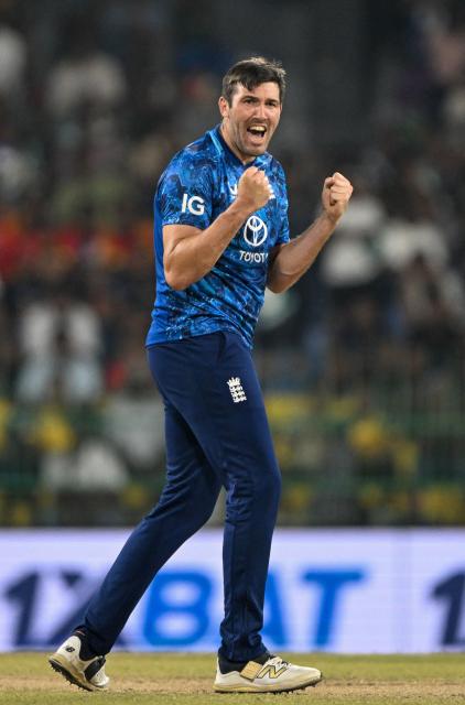 England's Jamie Overton celebrates after taking the wicket of Sri Lanka's Pathum Nissanka during the third one-day international (ODI) cricket match between Sri Lanka and England at the R. Premadasa International Cricket Stadium in Colombo on January 27, 2026. (Photo by Ishara S. KODIKARA / AFP)