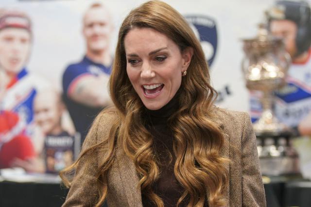 Britain's Catherine, Princess of Wales, smiles during a visit to Wakefield Trinity Rugby League club in Wakefield, northern England on January 27, 2026, to learn how their outreach programmes bring generations together and support individuals experiencing isolation in the community. (Photo by Ian Hodgson / POOL / AFP)