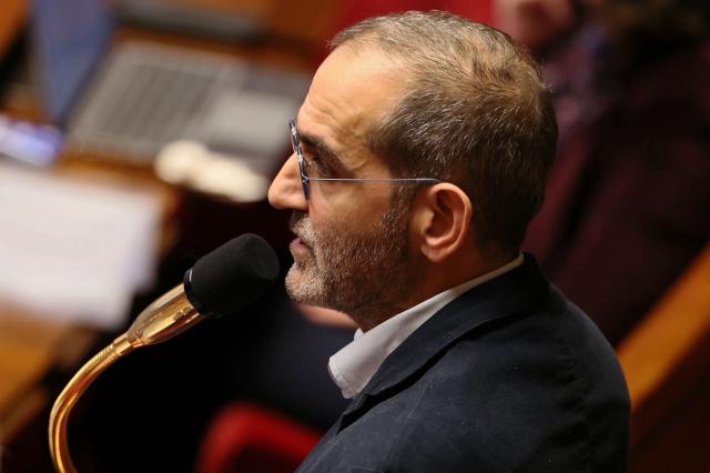 Ecologiste et Social's MP Pouria Amirshahi delivers a speech during a session of questions to the government at The National Assembly, France's lower house parliament, in Paris on January 27, 2026. On January 27, 2026, the Assembly is expected to reject two new motions of no confidence tabled by the left outside the PS and the far right, in response to Sebastien Lecornu's decision to once again use Article 49.3 to push through the expenditure section and the entire state budget for 2026. (Photo by Dimitar DILKOFF / AFP)