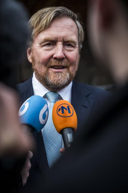 King Willem-Alexander of The Netherlands speaks to press after taking part in a meeting during a visit to Zeerijp, in the region of Groningen on January 27, 2026, months after the third-largest earthquakke hit the Groningen region. A 3.4-magnitude earthquake rocked a northern region of The Netherlands on November 14, 2025, one of the strongest ever to hit the area that has been plagued by quakes due to gas extraction. (Photo by Siese VEENSTRA / ANP / AFP) / Netherlands OUT
