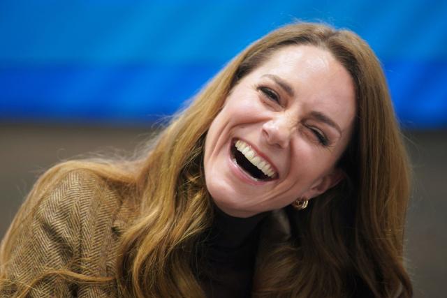 Britain's Catherine, Princess of Wales, laughs during a visit to Wakefield Trinity Rugby League club in Wakefield, northern England on January 27, 2026, to learn how their outreach programmes bring generations together and support individuals experiencing isolation in the community. (Photo by Ian Hodgson / POOL / AFP)