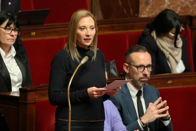 Rassemblement National's MP Stephanie Galzy (C) delivers a speech during a session of questions to the government at The National Assembly, France's lower house parliament, in Paris on January 27, 2026. On January 27, 2026, the Assembly is expected to reject two new motions of no confidence tabled by the left outside the PS and the far right, in response to the Prime Minister's decision to once again use Article 49.3 to push through the expenditure section and the entire state budget for 2026. (Photo by Dimitar DILKOFF / AFP)