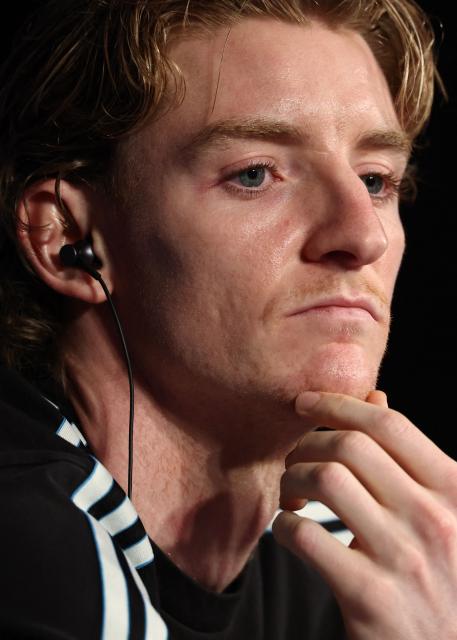 Newcastle United's English forward Anthony Gordon reacts as he attends a press conference at the Parc des Princes Stadium in western Paris on January 27, 2026, on the eve of the UEFA Champions League first round day 8 football match between Paris Saint-Germain and Newcastle. (Photo by FRANCK FIFE / AFP)