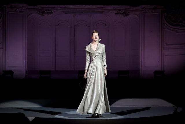 A model presents a creation by Julien Fournie for Women's Haute Couture Spring/Summer 2026 collection fashion show as part of the Paris Haute Couture Fashion Week, in Paris, on January 27, 2026. (Photo by Sebastien DUPUY / AFP)