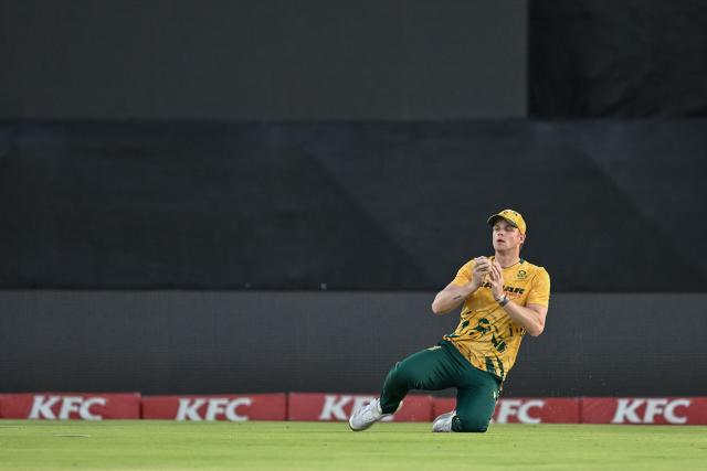 South Africa's George Linde catches the ball dismissing West Indies' Jason Holder during the first Twenty20 international cricket match between South Africa and West Indies at Boland Park in Paarl on January 27, 2026. (Photo by RODGER BOSCH / AFP)