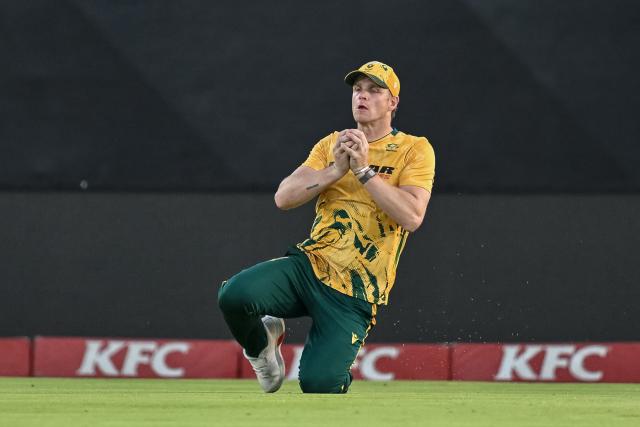 South Africa's George Linde catches the ball dismissing West Indies' Jason Holder during the first Twenty20 international cricket match between South Africa and West Indies at Boland Park in Paarl on January 27, 2026. (Photo by RODGER BOSCH / AFP)