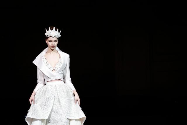 TOPSHOT - A model presents a creation by Julien Fournie for Women's Haute Couture Spring/Summer 2026 collection fashion show as part of the Paris Haute Couture Fashion Week, in Paris, on January 27, 2026. (Photo by Sebastien DUPUY / AFP)