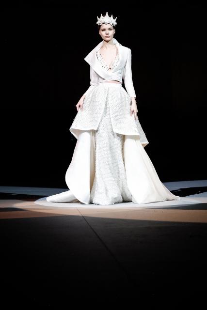 A model presents a creation by Julien Fournie for Women's Haute Couture Spring/Summer 2026 collection fashion show as part of the Paris Haute Couture Fashion Week, in Paris, on January 27, 2026. (Photo by Sebastien DUPUY / AFP)