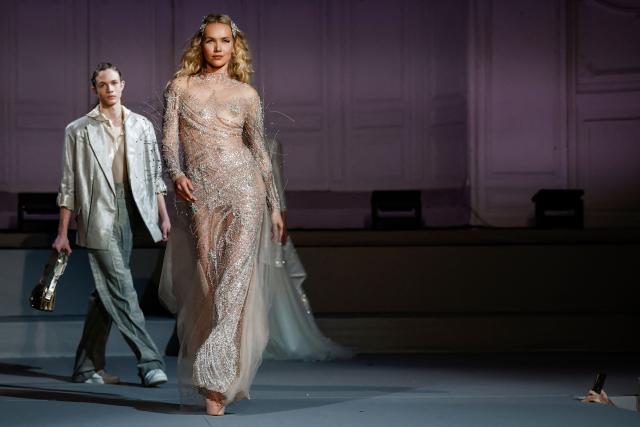 Czech model Michaela Tomanova presents a creation by Julien Fournie for Women's Haute Couture Spring/Summer 2026 collection fashion show as part of the Paris Haute Couture Fashion Week, in Paris, on January 27, 2026. (Photo by Sebastien DUPUY / AFP)