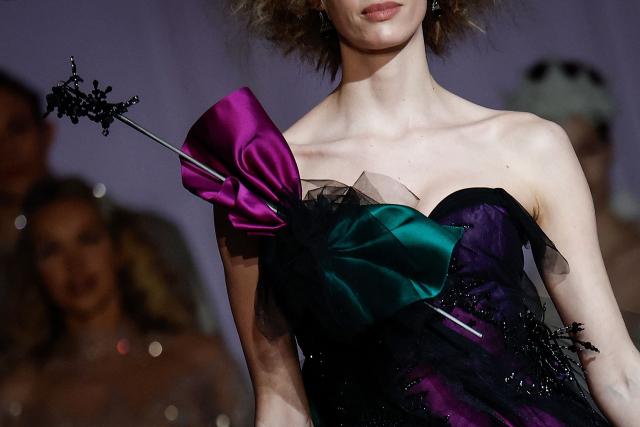 A model presents a creation by Julien Fournie for Women's Haute Couture Spring/Summer 2026 collection fashion show as part of the Paris Haute Couture Fashion Week, in Paris, on January 27, 2026. (Photo by Sebastien DUPUY / AFP)