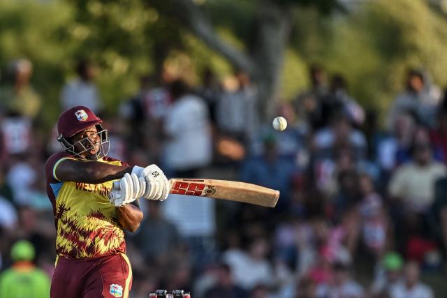 West Indies' Rovman Powell plays a shot during the first Twenty20 international cricket match between South Africa and West Indies at Boland Park in Paarl on January 27, 2026. (Photo by RODGER BOSCH / AFP)