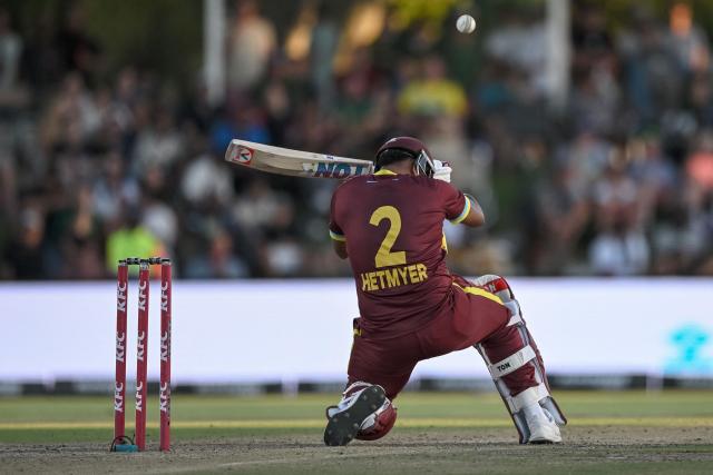 West Indies' Shimron Hetmyer ducks under a bouncer ball during the first Twenty20 international cricket match between South Africa and West Indies at Boland Park in Paarl on January 27, 2026. (Photo by RODGER BOSCH / AFP)