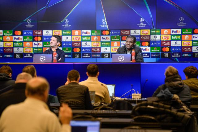 Inter Milan's Romanian head coach Cristian Chivu (L) and Inter Milan's German defender #31 Yann Aurel Bisseck address a press conference on January 27, 2026 in Dortmund, western Germany, on the eve of the UEFA Champions League league phase - day 8 football match between Borussia Dortmund and Inter Milan. (Photo by SASCHA SCHUERMANN / AFP)
