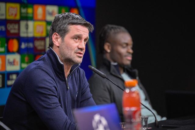 Inter Milan's Romanian head coach Cristian Chivu (L) and Inter Milan's German defender #31 Yann Aurel Bisseck address a press conference on January 27, 2026 in Dortmund, western Germany, on the eve of the UEFA Champions League league phase - day 8 football match between Borussia Dortmund and Inter Milan. (Photo by SASCHA SCHUERMANN / AFP)