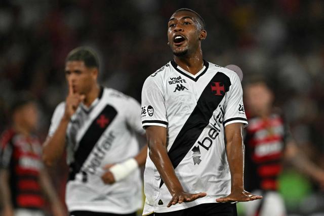 (FILES) Vasco da Gama's forward #77 Rayan Rocha celebrates scoring his team's first goal during the Brasileirao Serie A football match between Vasco da Gama and Flamengo at the Maracana stadium, in Rio de Janeiro, Brazil, on September 21, 2025. English club Bournemouth signed promising 19-year-old Brazilian striker Rayan from Vasco da Gama, both clubs announced on January 27, 2026. (Photo by Mauro PIMENTEL / AFP)