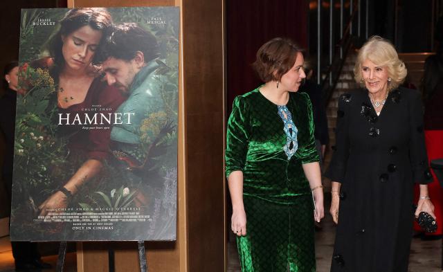Britain's Queen Camilla (R) attends a special screening of 'Hamnet', the film adaptation of Maggie O’Farrell's award-winning novel, in central London on January 27, 2026. (Photo by Isabel Infantes / POOL / AFP)