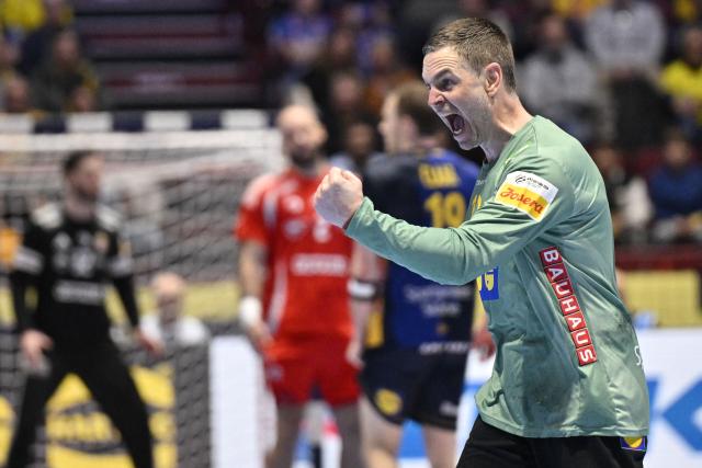 Sweden's goalkeeper #12 Andreas Palicka celebrates after making a save during the men's EHF Euro 2026 main round handball match Sweden v Hungary in Malmoe, Sweden, on January 27, 2026. (Photo by Johan Nilsson/TT / TT NEWS AGENCY / AFP) / Sweden OUT