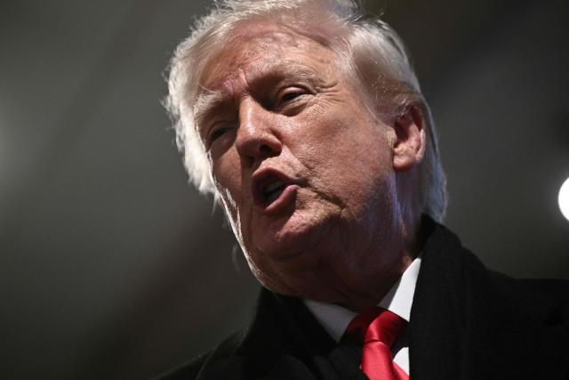 US President Donald Trump speaks during a stop at the Machine Shed restaurant in Urbandale, Iowa, on January 27, 2026. (Photo by Brendan SMIALOWSKI / AFP)