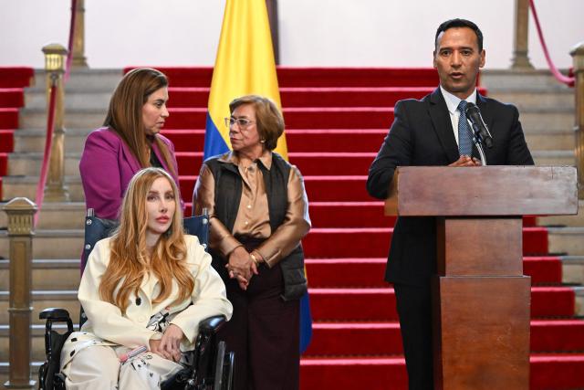 Colombian Defense Minister Pedro Sanchez (R) speaks next to Foreign Minister Rosa Yolanda Villavicencio (C), Vice Minister of Energy Karen Schutt (L) and Trade Minister Diana Morales during a press conference regarding the tariff dispute with Ecuador, in Bogota on January 27, 2026. (Photo by Raul ARBOLEDA / AFP)