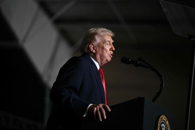 US President Donald Trump delivers remarks in Clive, Iowa, on January 27, 2026. (Photo by Brendan SMIALOWSKI / AFP)
