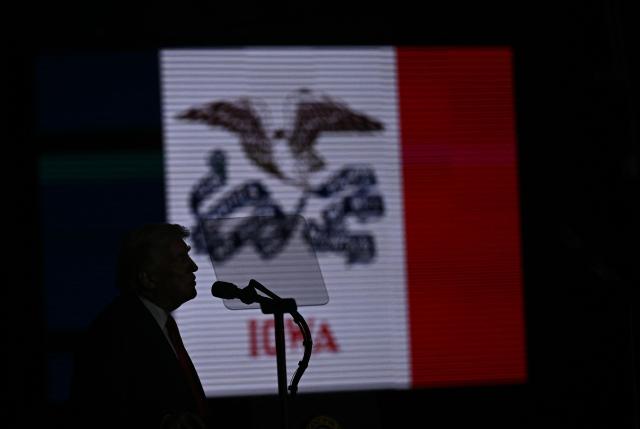 US President Donald Trump delivers remarks on the economy in Clive, Iowa, on January 27, 2026. (Photo by Brendan SMIALOWSKI / AFP)