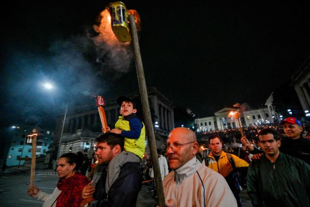 Cubans take part in the Torchlight March on the 173rd anniversary of National Hero Jose Marti (a leader of Cuba’s independence from Spain and founder of the Cuban Revolutionary Party) in Havana on January 27, 2026. (Photo by ADALBERTO ROQUE / AFP)