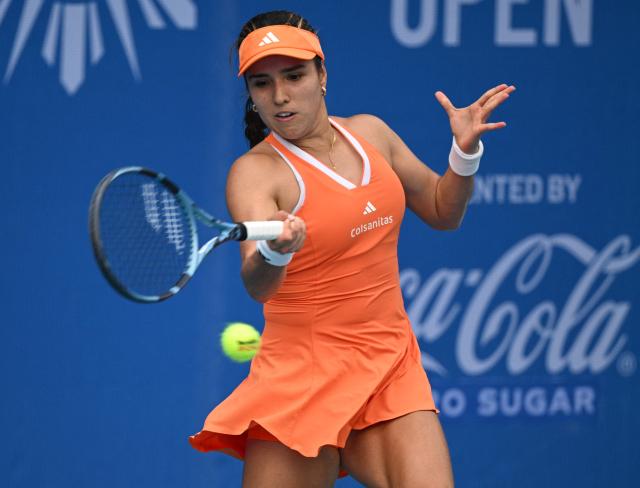 Camila Osorio of Colombia hits a return against Mai Hontama of Japan during their women's singles at the Philippine Women's Open tennis tournament in Manila on January 28, 2026. (Photo by Ted ALJIBE / AFP)