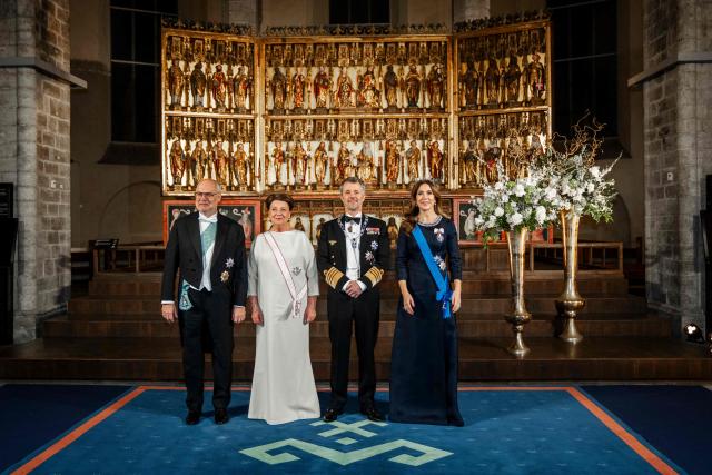 King Frederik X of Denmark (2ndT) Queen Mary of Denmark (R) and Estonia's President, Alar Karis (L) , with First Lady Sirje Karis pose ahead of a state banquet with a concert at St. Nicholas Church in Tallinn, on January 27, 2026. The royal couple is on a state visit to Estonia from January 27-28, 2026. The visit particularly focuses on digital resilience and cybersecurity. (Photo by Ida Marie Odgaard / Ritzau Scanpix / AFP) / Denmark OUT